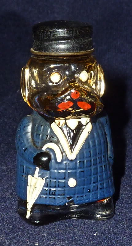 Old Glass Dog Bottle in blue Coat