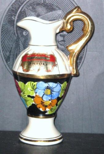 claret jug bright floral motif