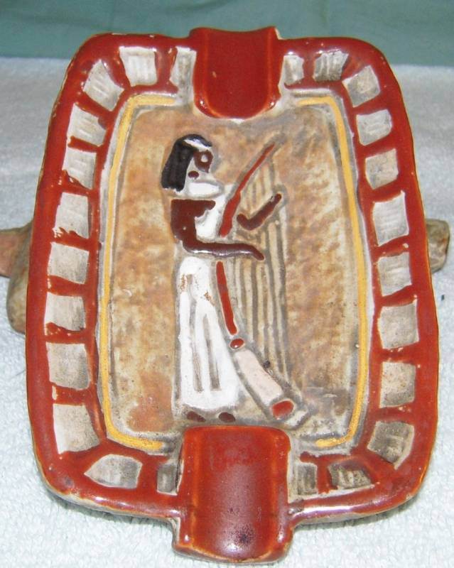 Egyptian woman playing a stringed instrument