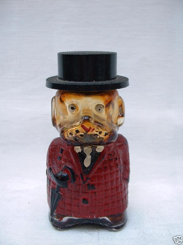 Old Glass Dog Bottle in blue Coat