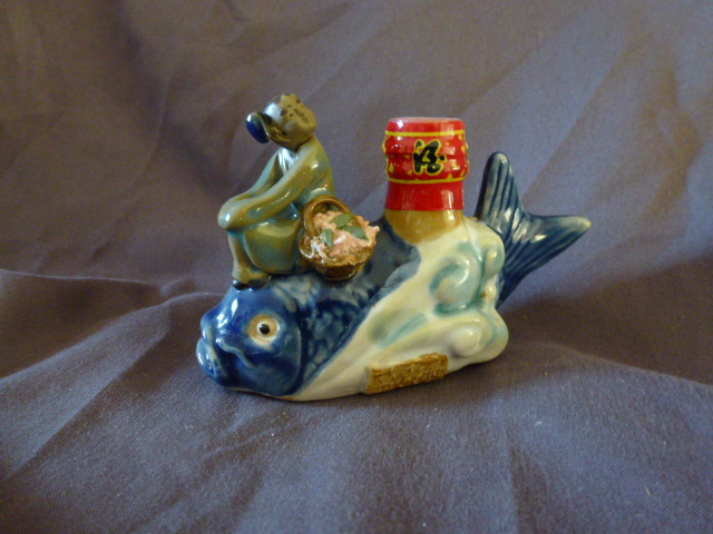 Chineese man on fish