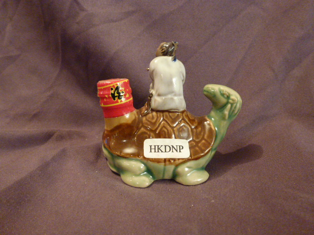 Chineese man on turtle