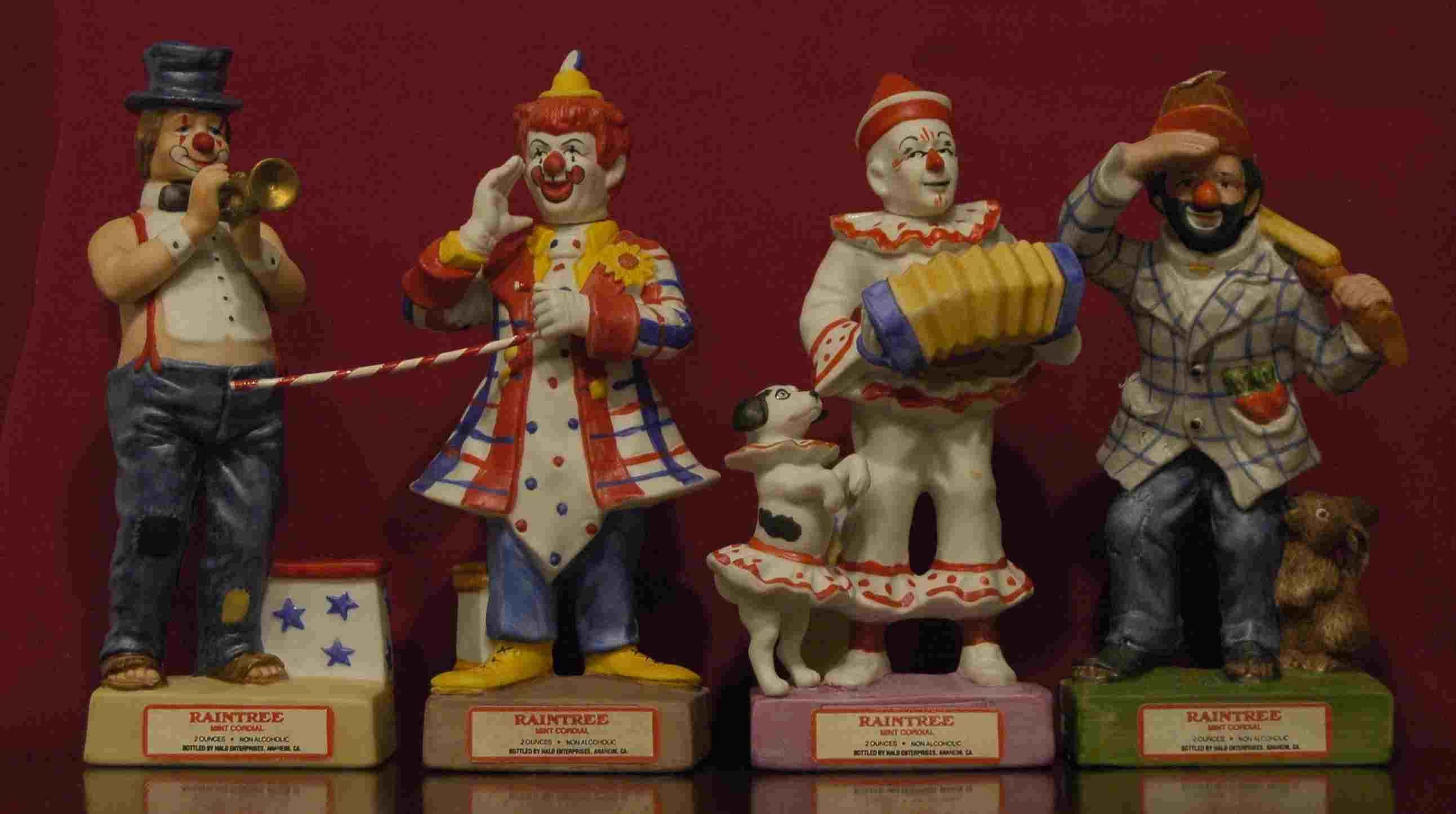 raintree clown with acordeon and dog
