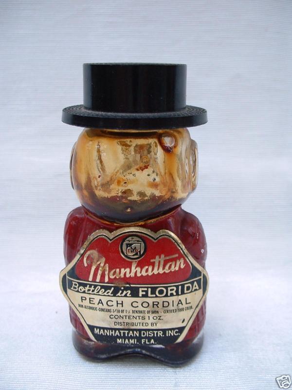 Old Glass Dog Bottle in blue Coat