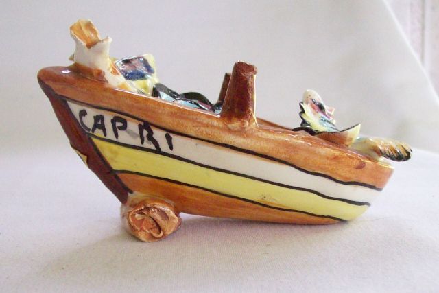Liquor Bottle or Decanter in the shape of a Row Boat with Fish and Oysters