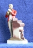 trumpet player by the piano