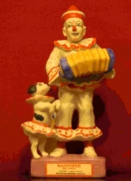 raintree clown with acordeon and dog