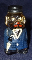 Old Glass Dog Bottle in blue Coat