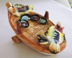 Liquor Bottle or Decanter in the shape of a Row Boat with Fish and Oysters